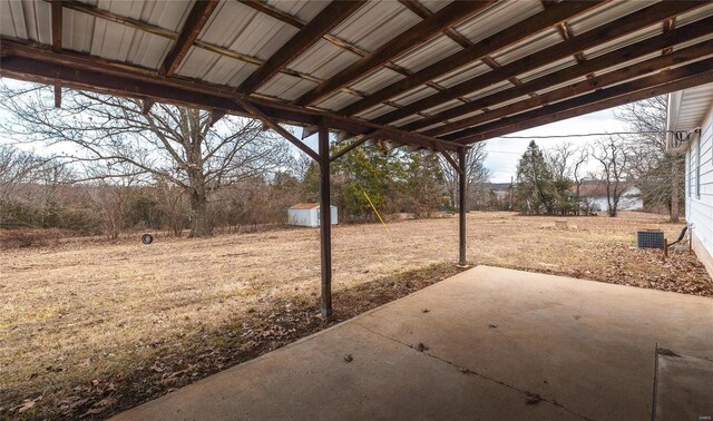 12000 State Rte E, Rolla, MO 65401 - view of patio / terrace with a storage unit and an outbuilding