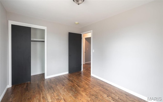 12000 State Rte E, Rolla, MO 65401 - unfurnished bedroom featuring a closet and wood finished floors