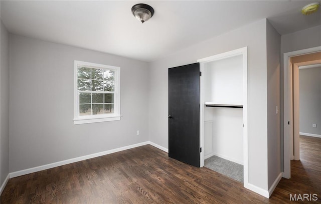12000 State Rte E, Rolla, MO 65401 - unfurnished bedroom featuring dark wood-style floors and a closet