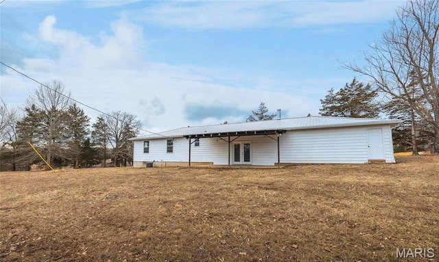 12000 State Rte E, Rolla, MO 65401 - rear view of property featuring french doors, a metal roof, and a lawn