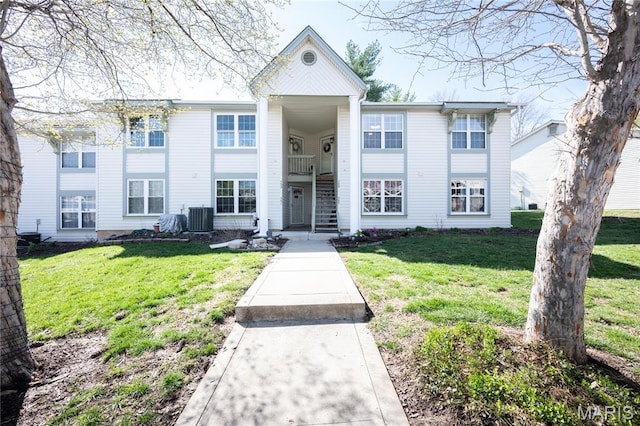 749 Sugar Glen Dr Unit 8, Saint Peters, MO 63376 - view of front facade with central AC and a front lawn