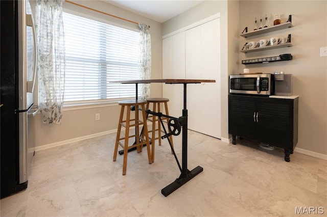 749 Sugar Glen Dr Unit 8, Saint Peters, MO 63376 - dining space with baseboards