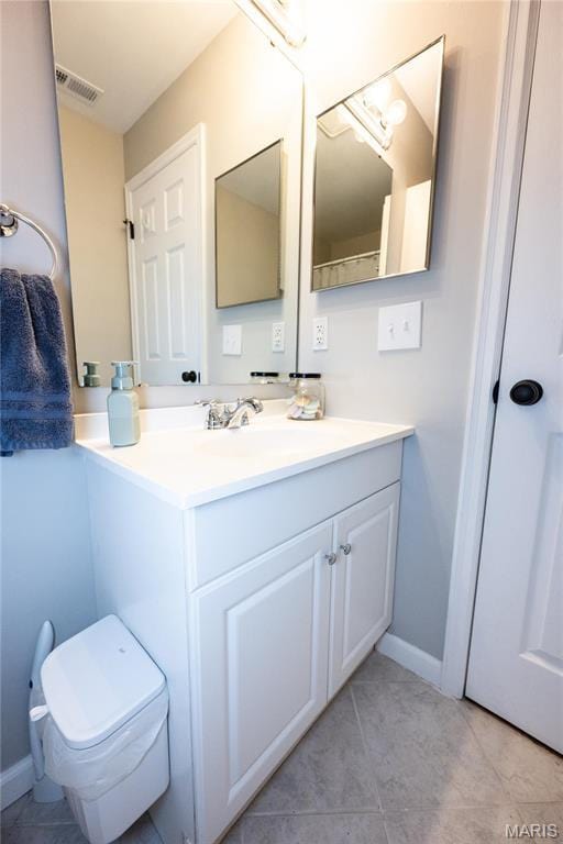 749 Sugar Glen Dr Unit 8, Saint Peters, MO 63376 - bathroom featuring vanity, toilet, baseboards, and tile patterned floors