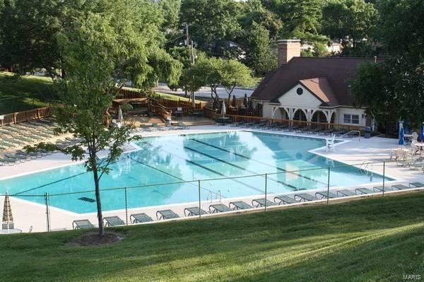 1767 High School Dr, Brentwood, MO 63144 - community pool with a lawn