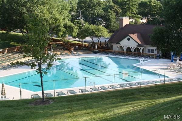 1767 High School Dr, Brentwood, MO 63144 - community pool with a yard