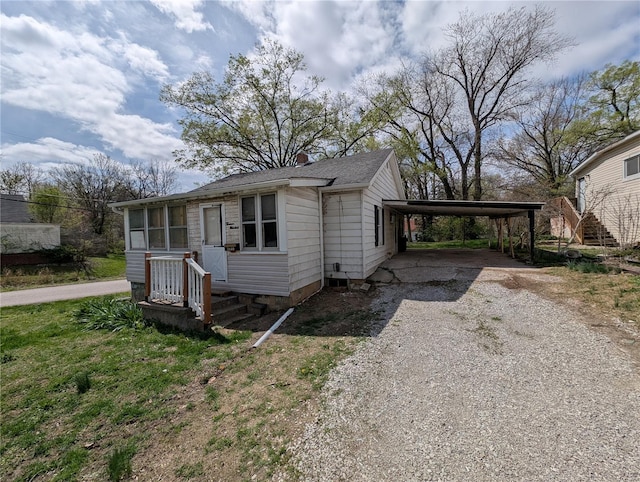 1300 Rixon, Alton, IL 62002 - view of front of house with driveway and a carport