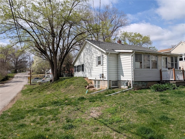 1300 Rixon, Alton, IL 62002 - view of side of property with a chimney and a lawn
