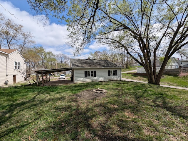 1300 Rixon, Alton, IL 62002 - view of grassy yard with a carport