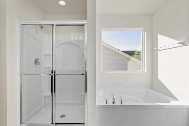 2414 Chukka Dr, Eureka, MO 63025 - full bathroom with a shower stall, a garden tub, and recessed lighting