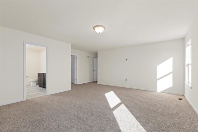 2414 Chukka Dr, Eureka, MO 63025 - unfurnished living room with light carpet and baseboards