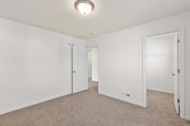 2414 Chukka Dr, Eureka, MO 63025 - unfurnished bedroom featuring carpet floors, a spacious closet, a closet, and baseboards