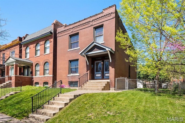 4525 Oakland Ave, Saint Louis, MO 63110 - view of front facade with brick siding and stairway
