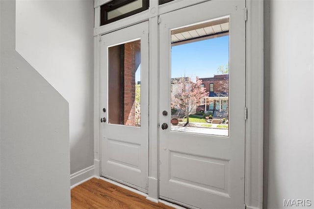 4525 Oakland Ave, Saint Louis, MO 63110 - doorway to outside with wood finished floors and baseboards