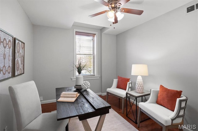 4525 Oakland Ave, Saint Louis, MO 63110 - home office with baseboards, ceiling fan, and wood finished floors