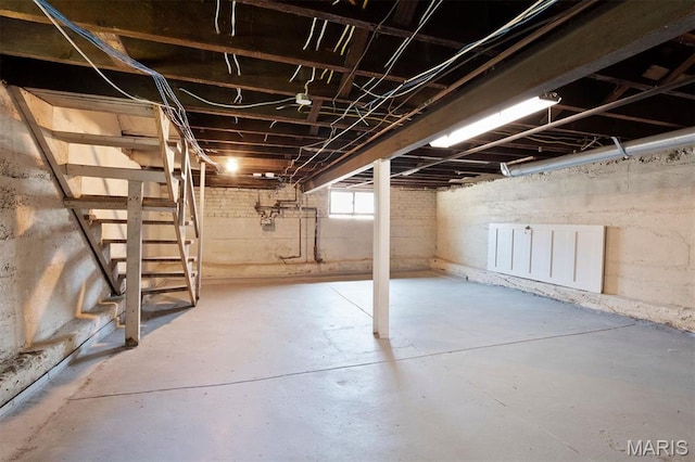 4525 Oakland Ave, Saint Louis, MO 63110 - basement featuring stairway and gas meter