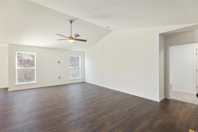 16787 River Stone Dr, Florissant, MO 63031 - unfurnished living room featuring vaulted ceiling, ceiling fan, dark wood-type flooring, and baseboards