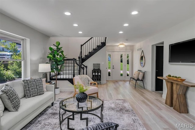 406 Meyer Ave, Saint Louis, MO 63122 - living area with stairs, healthy amount of natural light, recessed lighting, and light wood-type flooring