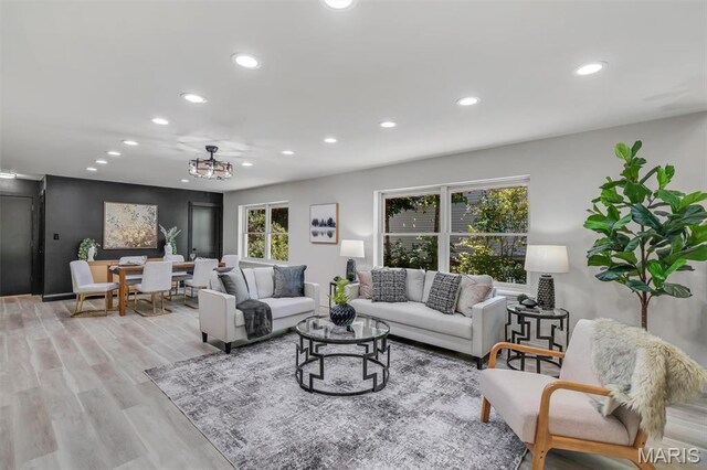 406 Meyer Ave, Saint Louis, MO 63122 - living area featuring recessed lighting, light wood finished floors, and a chandelier