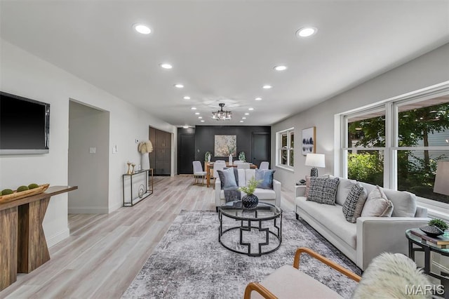406 Meyer Ave, Saint Louis, MO 63122 - living area with recessed lighting, a chandelier, and light wood-type flooring