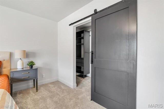 406 Meyer Ave, Saint Louis, MO 63122 - bedroom with light carpet and a barn door