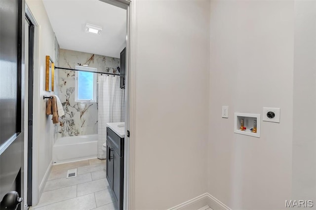 406 Meyer Ave, Saint Louis, MO 63122 - laundry area with electric dryer hookup, washer hookup, and light tile patterned flooring