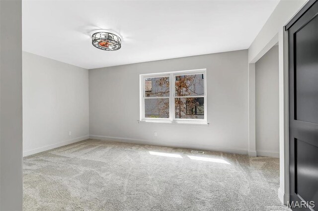 406 Meyer Ave, Saint Louis, MO 63122 - spare room featuring carpet flooring