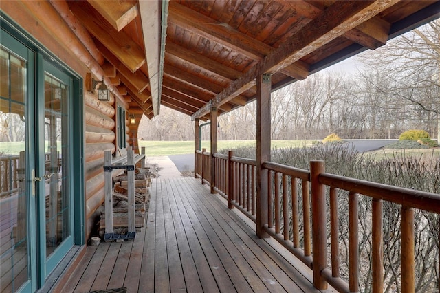 wooden terrace featuring french doors