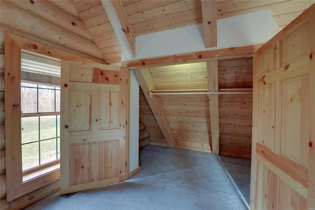 additional living space with wooden ceiling, healthy amount of natural light, and light colored carpet