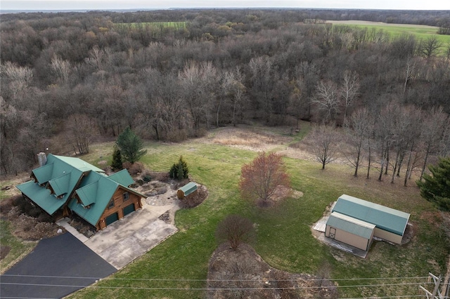 view from above of property featuring a forest