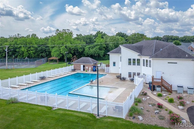 community pool featuring a patio