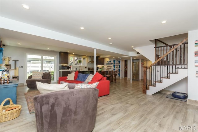 86 Pebblebrook Ln, Saint Louis, MO 63146 - living area with light wood-style flooring, stairs, and recessed lighting