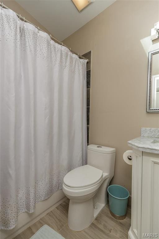 86 Pebblebrook Ln, Saint Louis, MO 63146 - bathroom with toilet, vanity, and shower / bathtub combination with curtain