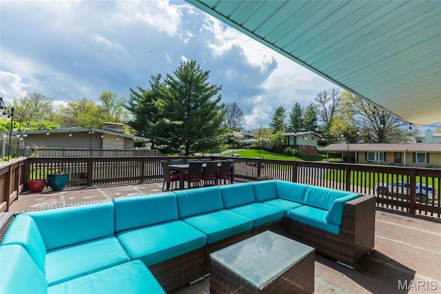 86 Pebblebrook Ln, Saint Louis, MO 63146 - wooden deck featuring outdoor lounge area, outdoor dining space, a residential view, and a patio area