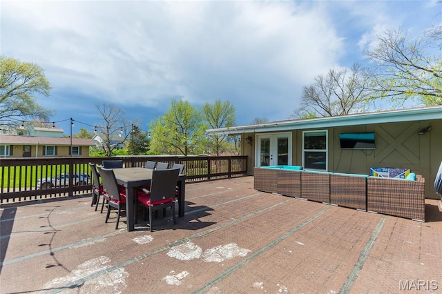 86 Pebblebrook Ln, Saint Louis, MO 63146 - deck with an outdoor living space, french doors, outdoor dining space, and a patio area