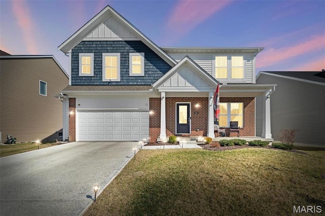 905 Sugar Pear St, Saint Charles, MO 63301 - view of front of home with a porch, brick siding, board and batten siding, and a garage