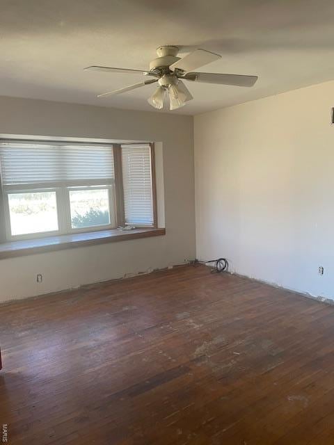 310 Pleasant Ave, Bland, MO 65014 - unfurnished room featuring wood finished floors and a ceiling fan