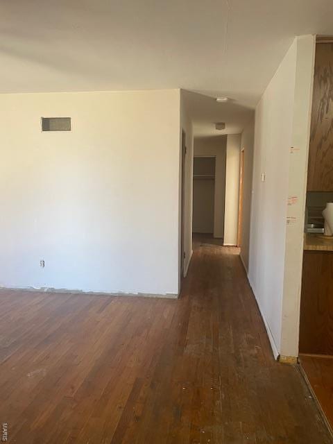 310 Pleasant Ave, Bland, MO 65014 - hall with dark wood-style flooring