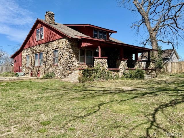 1681 S US Highway 63, West Plains, MO 65775 - view of front of property featuring a chimney and stone siding