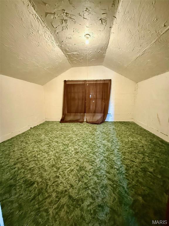 1681 S US Highway 63, West Plains, MO 65775 - bonus room with lofted ceiling, carpet flooring, a textured ceiling, and baseboards