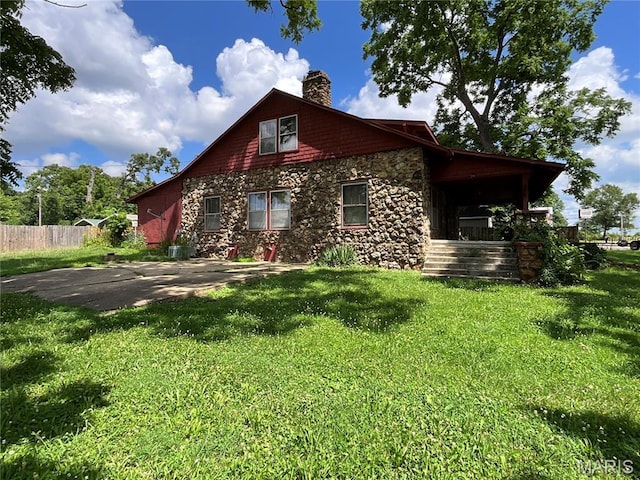 1681 S US Highway 63, West Plains, MO 65775 - view of front of house featuring stone siding and a chimney