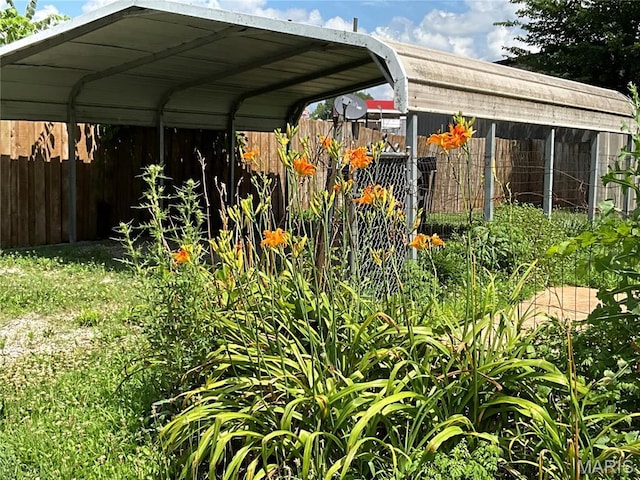 1681 S US Highway 63, West Plains, MO 65775 - view of vehicle parking with a detached carport