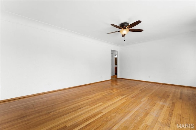 304 S Augusta St, Ofallon, IL 62269 - unfurnished room featuring a ceiling fan, light wood-style flooring, and baseboards