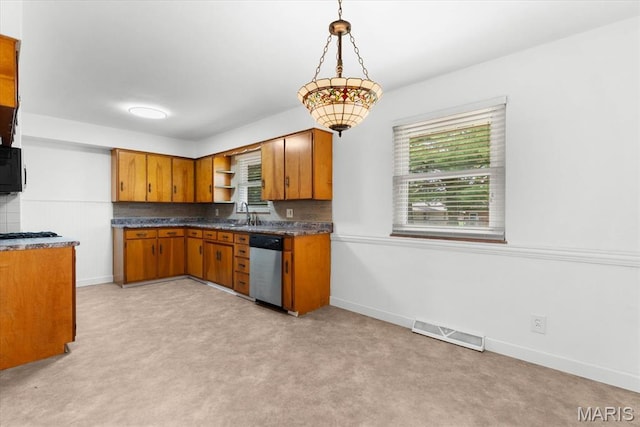 304 S Augusta St, Ofallon, IL 62269 - kitchen with dishwasher, brown cabinets, plenty of natural light, and open shelves