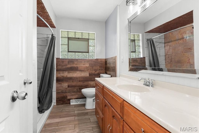 304 S Augusta St, Ofallon, IL 62269 - bathroom featuring vanity, toilet, wood finished floors, and curtained shower