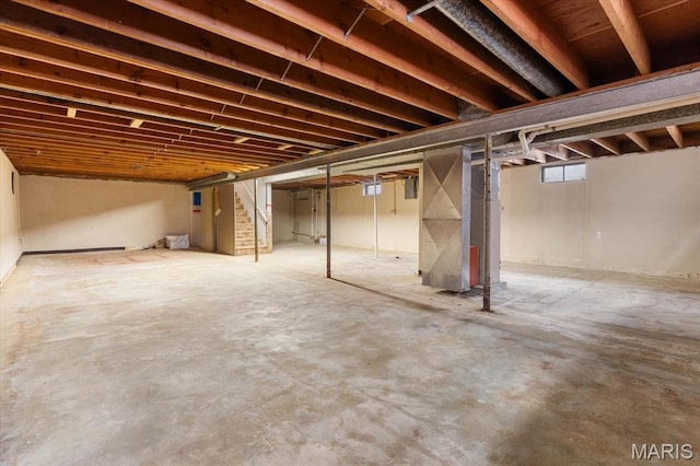 304 S Augusta St, Ofallon, IL 62269 - below grade area featuring stairs and heating unit