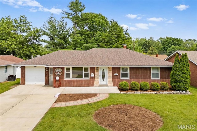 304 S Augusta St, Ofallon, IL 62269 - ranch-style home with a garage, roof with shingles, a front lawn, and concrete driveway
