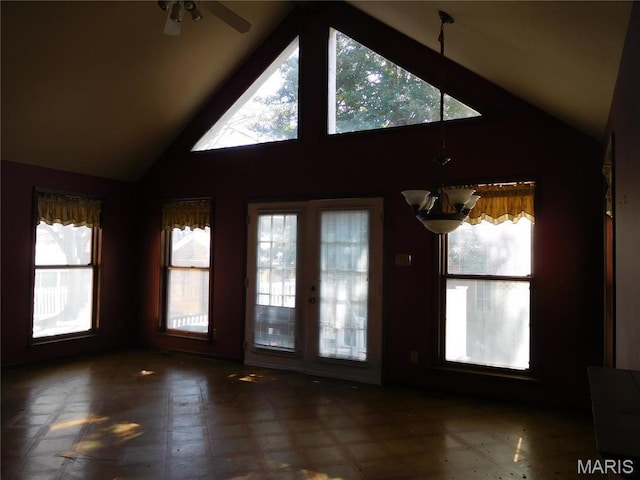 6432 Lansdowne Ave, Saint Louis, MO 63109 - unfurnished room featuring healthy amount of natural light, a chandelier, and high vaulted ceiling