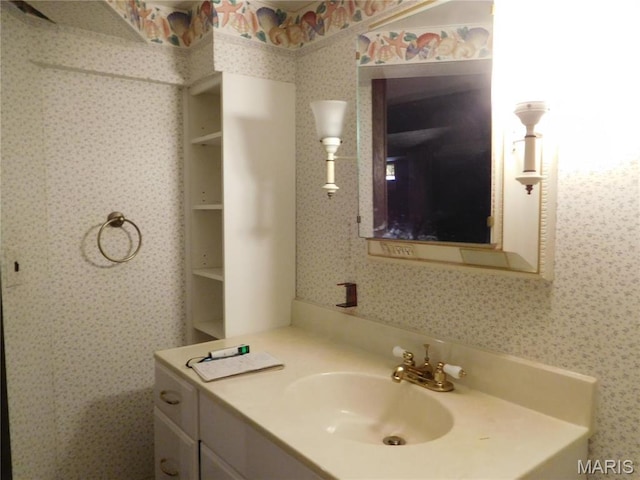 6432 Lansdowne Ave, Saint Louis, MO 63109 - bathroom with wallpapered walls and vanity