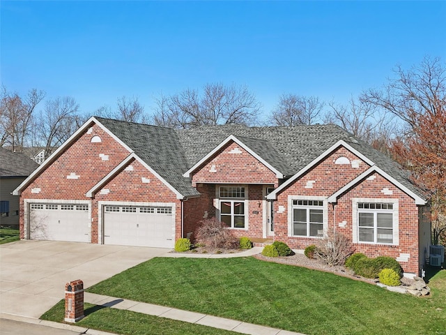 2707 Fairway Estates Dr, Wentzville, MO 63385 - traditional home with a front lawn, driveway, brick siding, and a garage