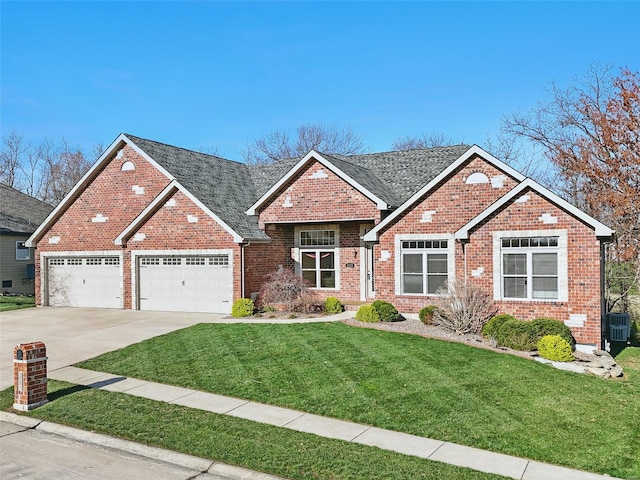 2707 Fairway Estates Dr, Wentzville, MO 63385 - view of front of property with a front yard, brick siding, concrete driveway, a garage, and central AC unit